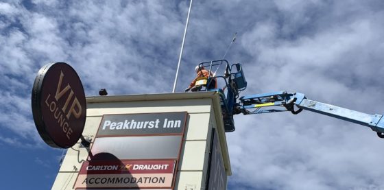 Demolition of a tower roof structure and signage removal in Peakhurst